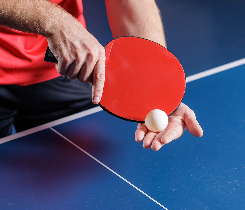 Ping pong ball on player's hand