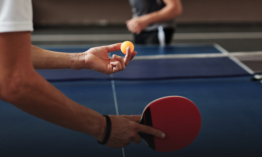 Close-up of table tennis serve action
