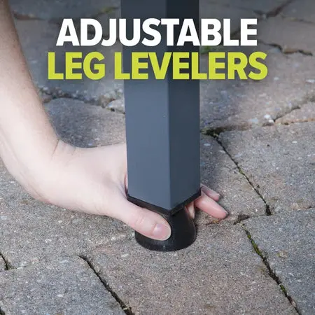 Hand adjusting leg leveler on uneven surface