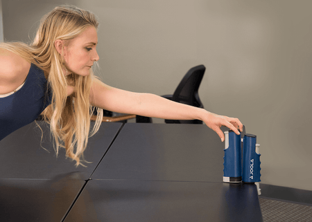 Woman setting up table tennis net
