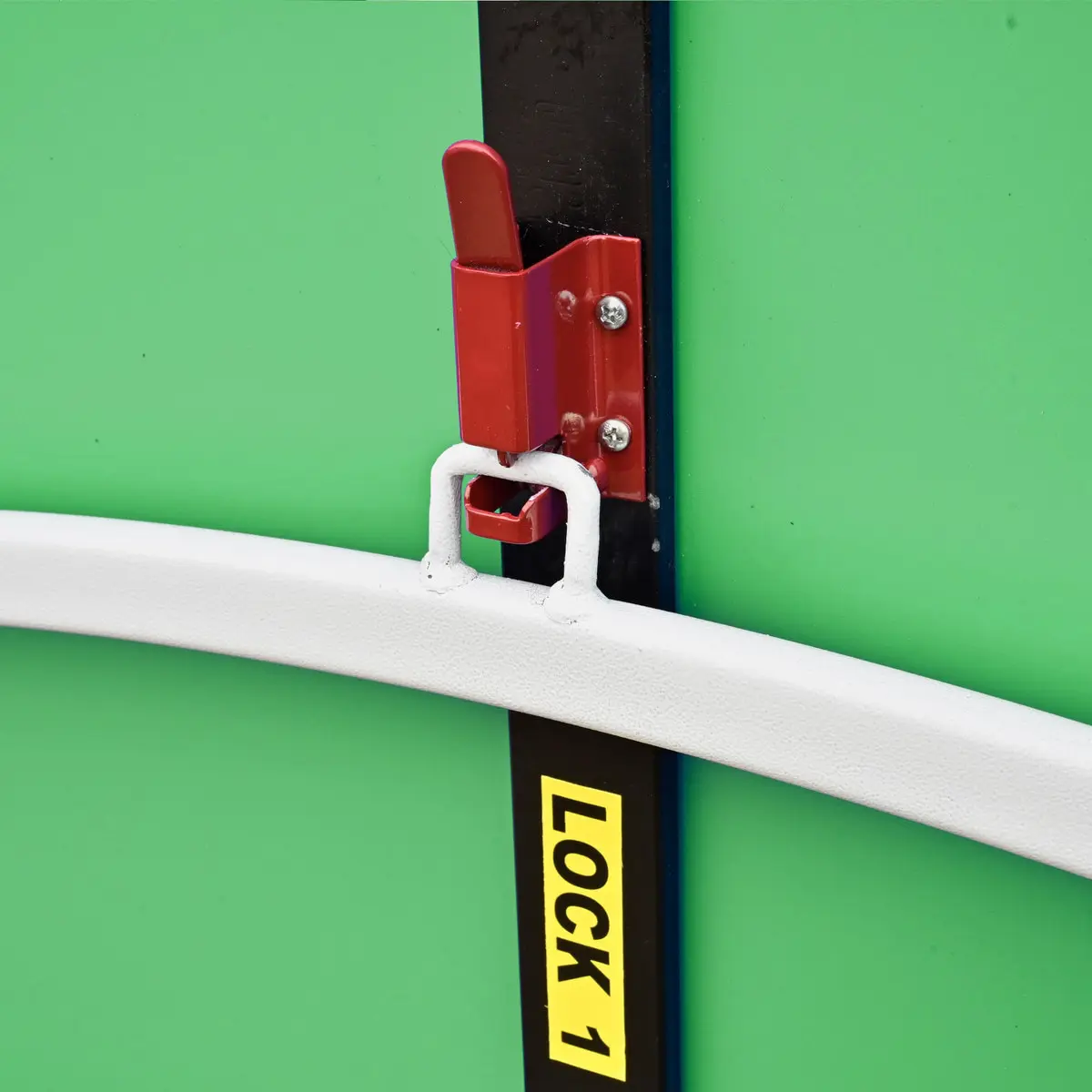 Red latch on green background