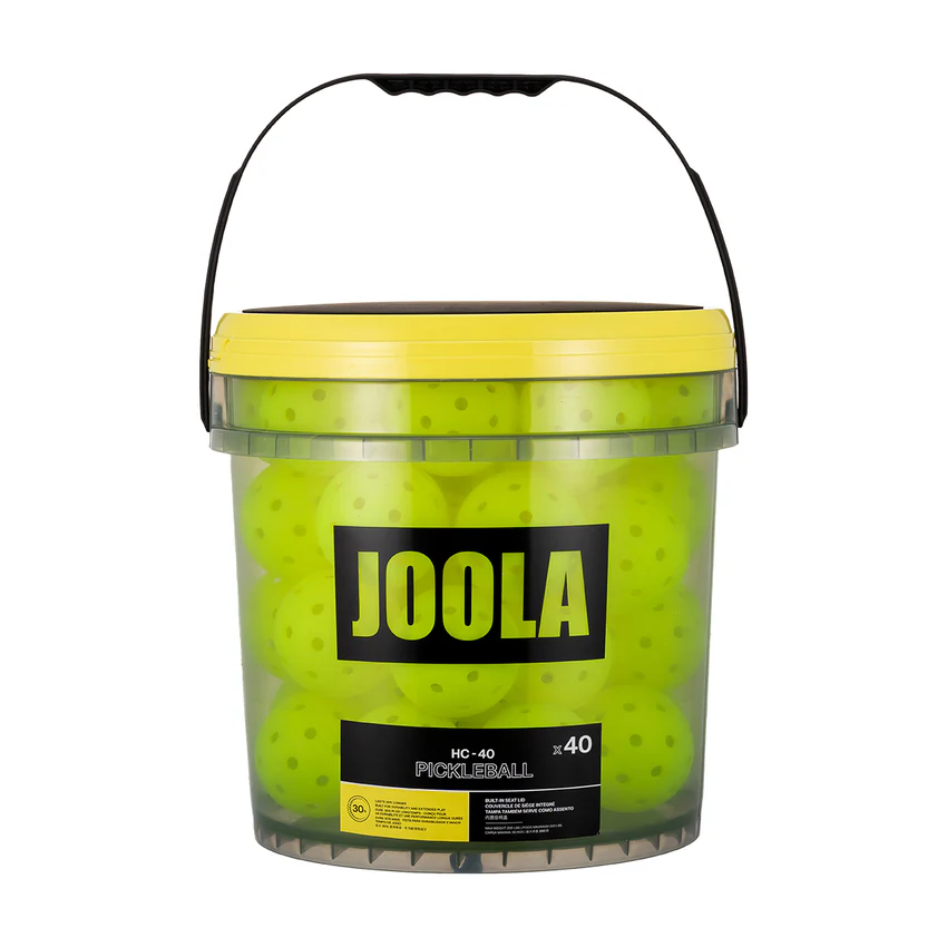 Bucket of green pickleball balls