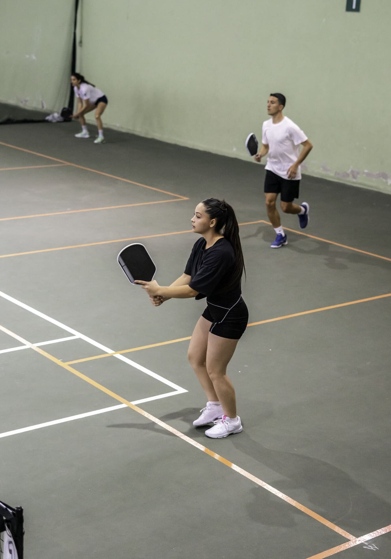 Group enjoying pickleball game